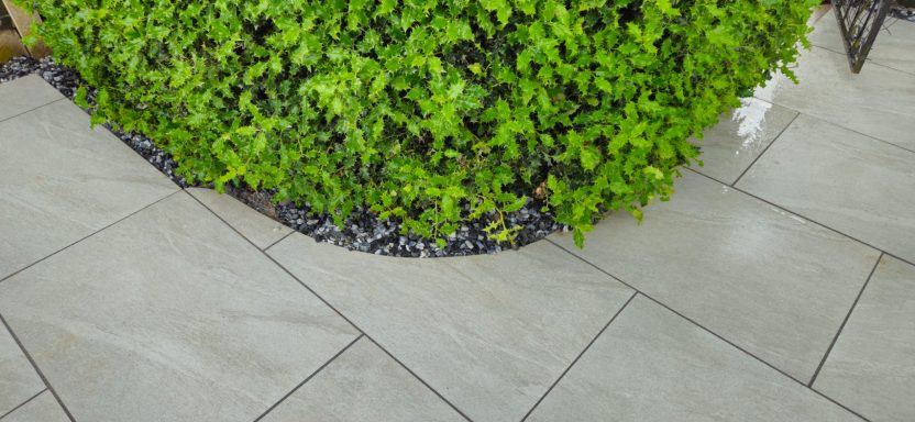 Raised patio, porcelain slabs & Turf