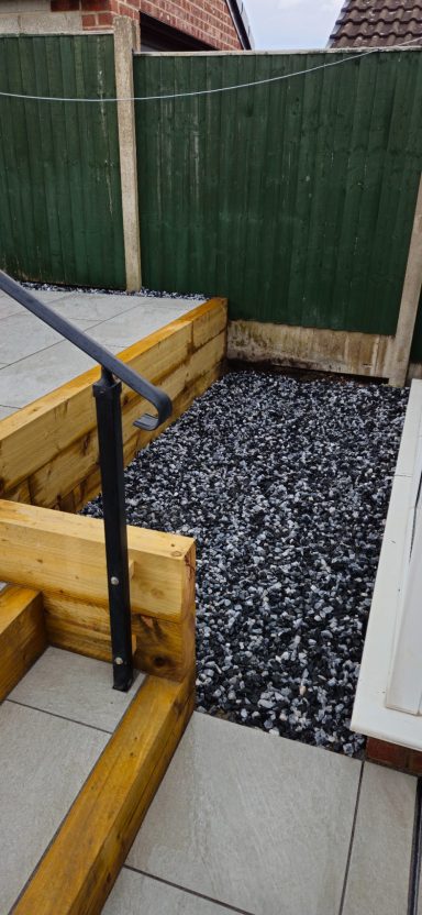 Raised patio, porcelain slabs & Turf