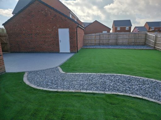 Resin patio, Stoned path & Artificial grass
