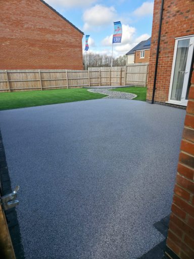 Resin patio, Stoned path & Artificial grass