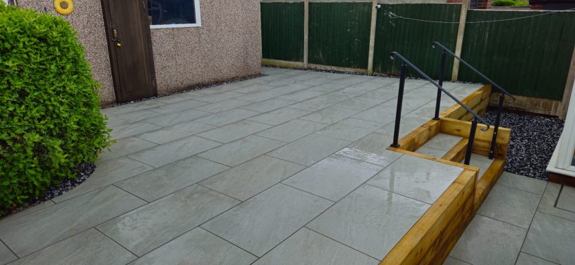 Raised patio, porcelain slabs & Turf