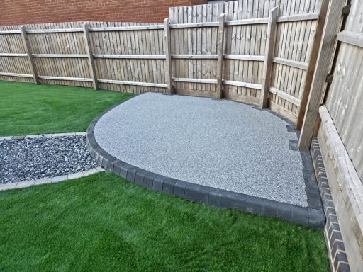 Resin patio, Stoned path & Artificial grass