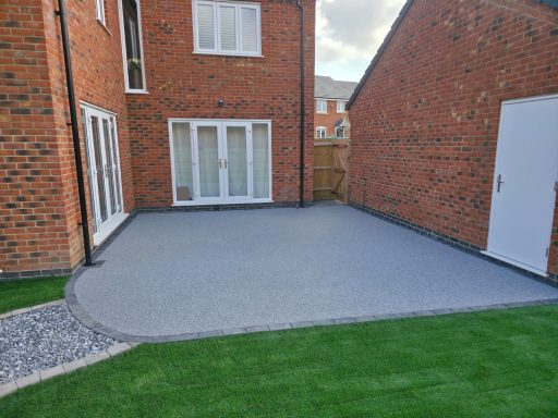 Resin patio, Stoned path & Artificial grass